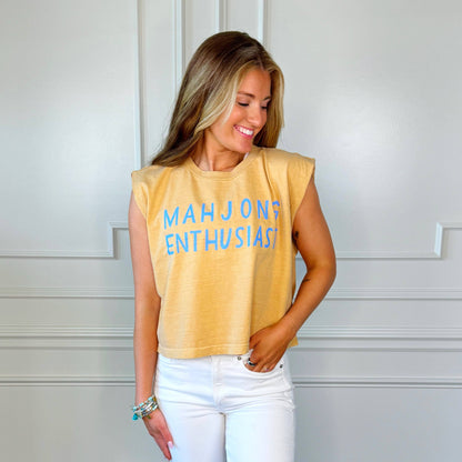 Woman wearing a yellow sleeveless shirt with 'MAH JONG ENTHUSIAST' text against a white background