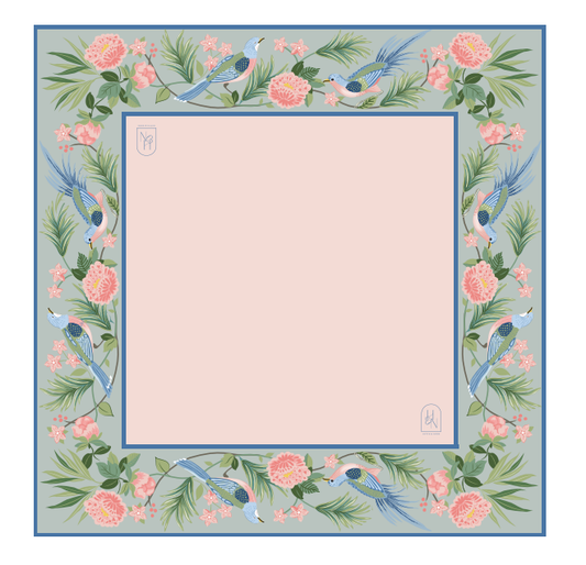 Decorative mahjong mat with floral and bird pattern on a light blue background